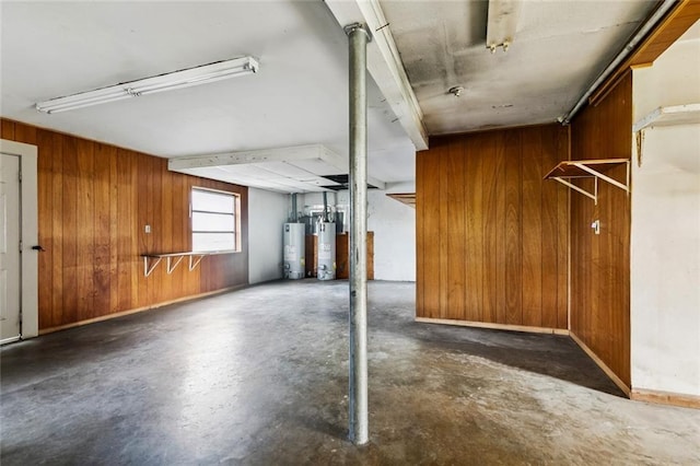400 Aris Ave, Metairie, LA 70005 - garage featuring wood walls and gas water heater