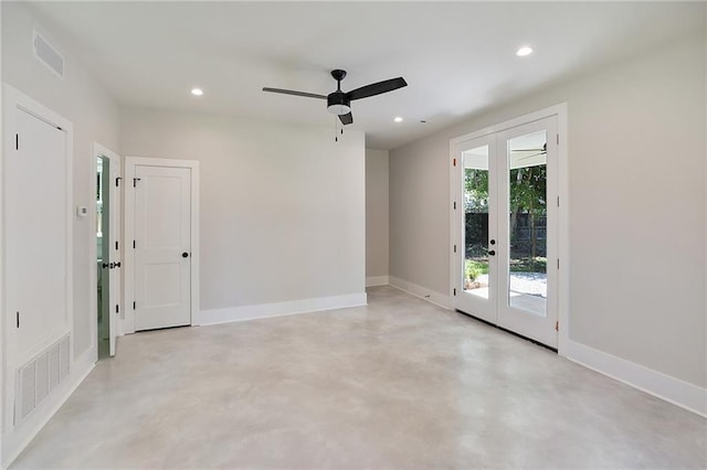 218 N Jackson Ave, Covington, LA 70433 - unfurnished room featuring french doors, finished concrete floors, a ceiling fan, recessed lighting, and baseboards