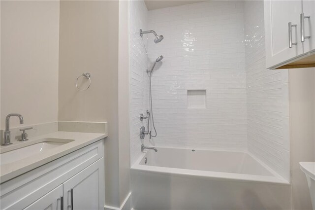 218 N Jackson Ave, Covington, LA 70433 - full bathroom featuring shower / washtub combination, vanity, and toilet