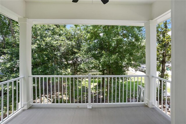 218 N Jackson Ave, Covington, LA 70433 - covered porch with a ceiling fan