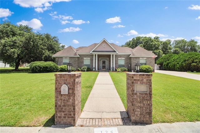 135 Maud Olive Dr, Belle Chasse, LA 70037 - neoclassical / greek revival house with a front yard