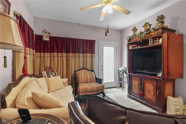 135 Maud Olive Dr, Belle Chasse, LA 70037 - living area with a ceiling fan and light tile patterned floors