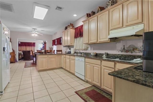 135 Maud Olive Dr, Belle Chasse, LA 70037 - kitchen featuring under cabinet range hood, white appliances, a peninsula, and light brown cabinetry