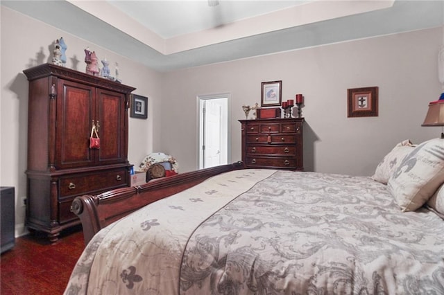 135 Maud Olive Dr, Belle Chasse, LA 70037 - bedroom featuring dark colored carpet and a raised ceiling