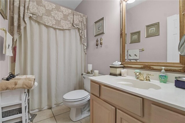 135 Maud Olive Dr, Belle Chasse, LA 70037 - full bathroom with tile patterned flooring, vanity, and a shower with shower curtain