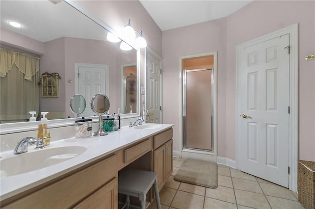 135 Maud Olive Dr, Belle Chasse, LA 70037 - bathroom with tile patterned floors, a stall shower, and double vanity