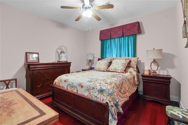 135 Maud Olive Dr, Belle Chasse, LA 70037 - bedroom featuring dark wood-style floors and ceiling fan