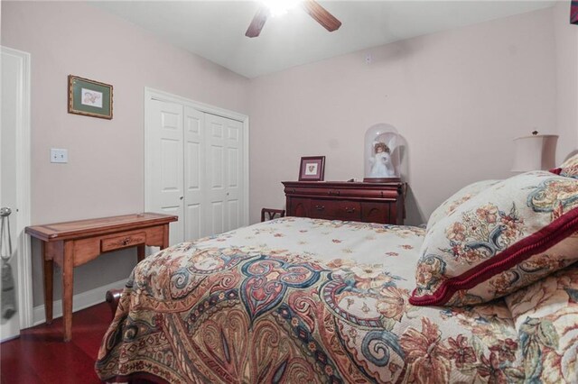 135 Maud Olive Dr, Belle Chasse, LA 70037 - bedroom with wood finished floors, a closet, and ceiling fan
