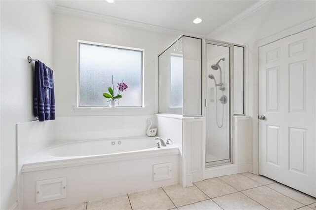 436 Northpark Blvd, Covington, LA 70433 - full bathroom featuring a stall shower, tile patterned floors, a bath, and crown molding