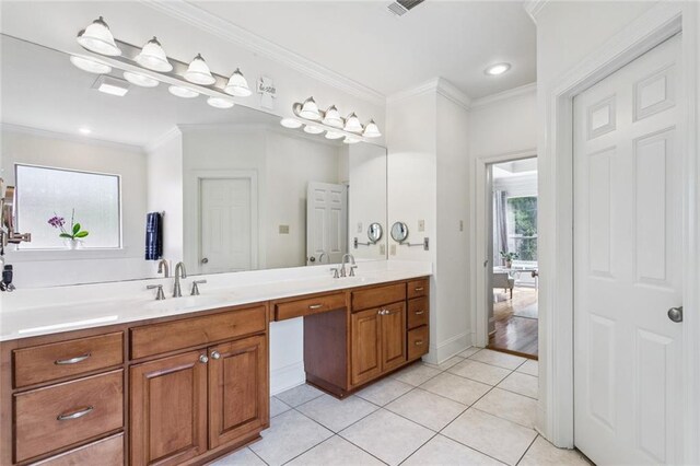436 Northpark Blvd, Covington, LA 70433 - full bathroom with double vanity, tile patterned floors, crown molding, and recessed lighting