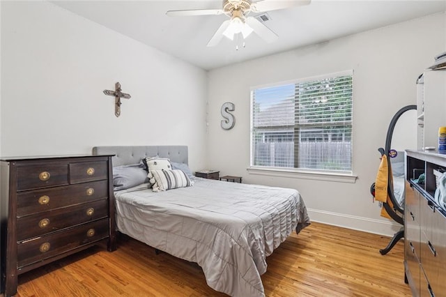 436 Northpark Blvd, Covington, LA 70433 - bedroom with light wood-type flooring, baseboards, and ceiling fan