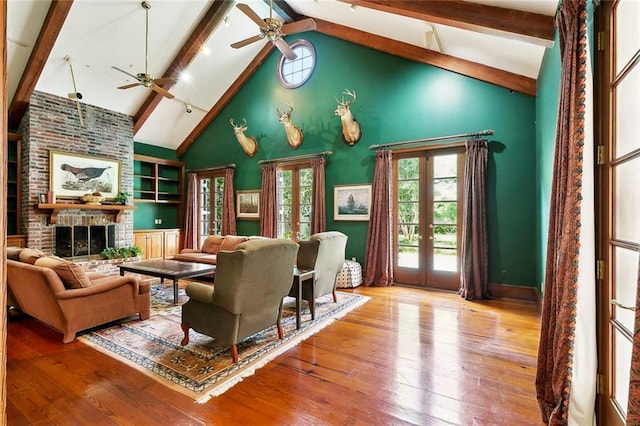 9816 Elm Pl, River Ridge, LA 70123 - living room with ceiling fan, french doors, beamed ceiling, high vaulted ceiling, and wood-type flooring