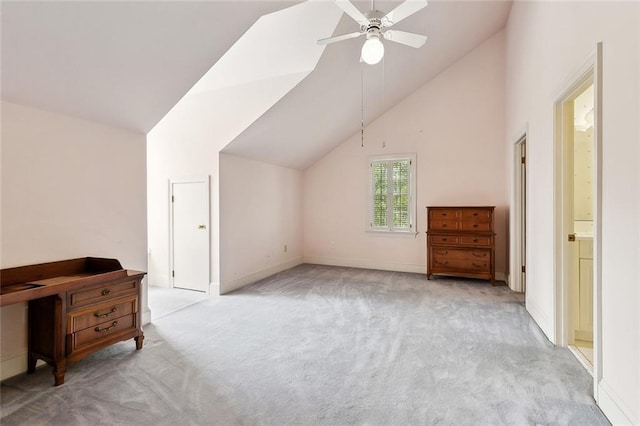 9816 Elm Pl, River Ridge, LA 70123 - unfurnished bedroom featuring vaulted ceiling, carpet, baseboards, connected bathroom, and a ceiling fan