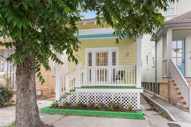 2718 Palmyra St, New Orleans, LA 70119 - entrance to property featuring covered porch