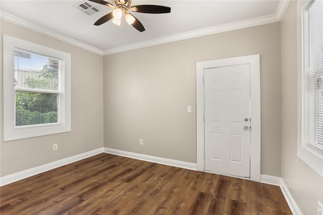 2718 Palmyra St, New Orleans, LA 70119 - spare room with ornamental molding, ceiling fan, dark wood finished floors, and baseboards