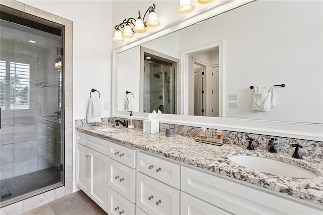 28 Wax Myrtle Ln, Covington, LA 70433 - full bath featuring double vanity, a shower stall, and tile patterned flooring
