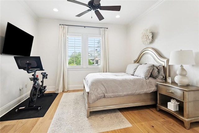 28 Wax Myrtle Ln, Covington, LA 70433 - bedroom with wood finished floors, crown molding, baseboards, recessed lighting, and ceiling fan