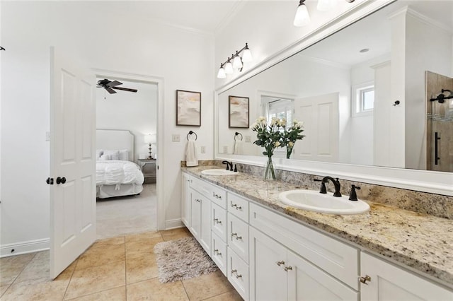 28 Wax Myrtle Ln, Covington, LA 70433 - full bathroom with double vanity, crown molding, ensuite bathroom, tile patterned floors, and baseboards