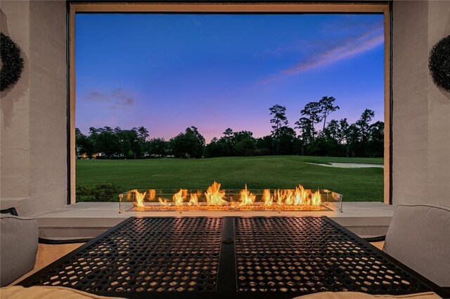 28 Wax Myrtle Ln, Covington, LA 70433 - view of patio / terrace with an outdoor fire pit