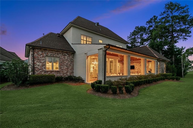 28 Wax Myrtle Ln, Covington, LA 70433 - rear view of property with a lawn and brick siding