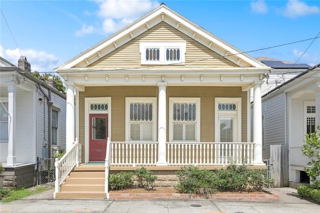 1208 Joseph St, New Orleans, LA 70115 - view of front of property with a porch