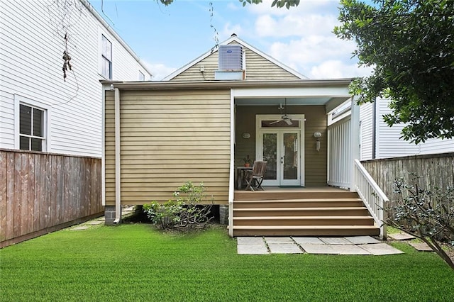 1208 Joseph St, New Orleans, LA 70115 - view of exterior entry with a ceiling fan, french doors, and covered porch
