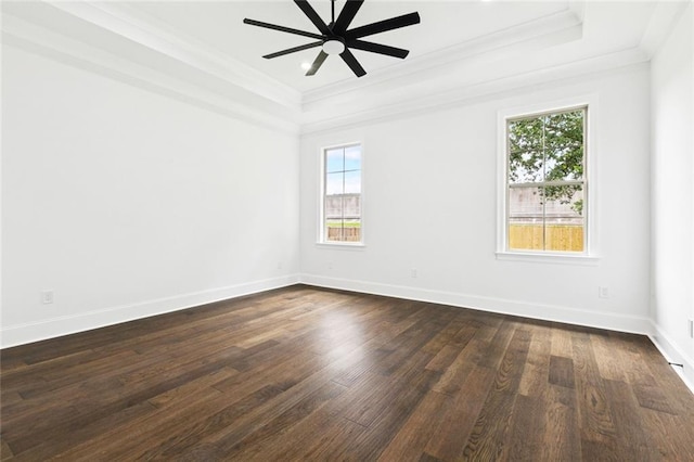 5516 Warrington Dr, New Orleans, LA 70122 - empty room featuring a raised ceiling, ornamental molding, a ceiling fan, dark wood-type flooring, and baseboards