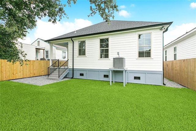 5516 Warrington Dr, New Orleans, LA 70122 - rear view of house featuring crawl space, central AC unit, and roof with shingles