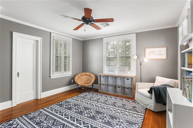 6035 Louis Xiv St, New Orleans, LA 70124 - sitting room with wood finished floors, baseboards, a ceiling fan, and crown molding