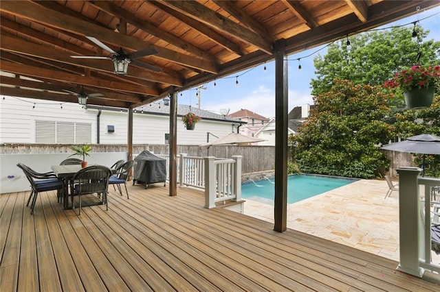6035 Louis Xiv St, New Orleans, LA 70124 - wooden deck with a fenced backyard, a ceiling fan, outdoor dining area, an outdoor pool, and a patio