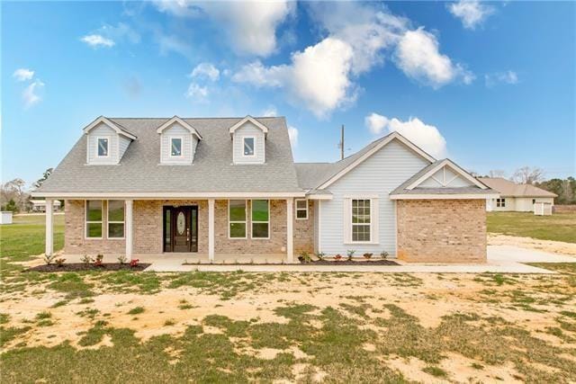 32315 Peace Rd, Franklinton, LA 70438 - view of front of home with covered porch and brick siding