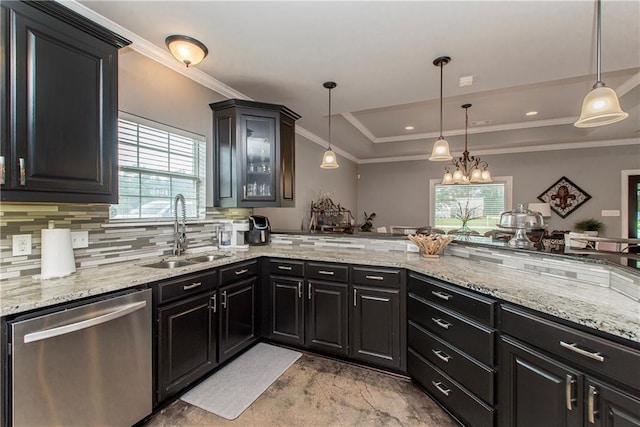 42251 Jefferson Dr, Hammond, LA 70403 - kitchen featuring dishwasher, a sink, a tray ceiling, dark cabinets, and decorative backsplash