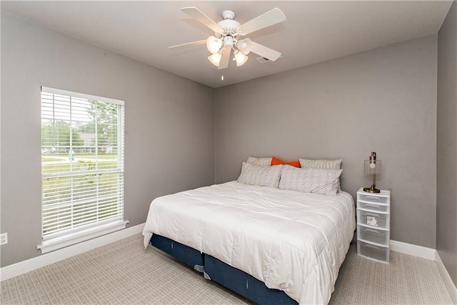 42251 Jefferson Dr, Hammond, LA 70403 - bedroom featuring baseboards, carpet flooring, and ceiling fan