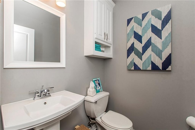 42251 Jefferson Dr, Hammond, LA 70403 - half bath featuring a sink and toilet