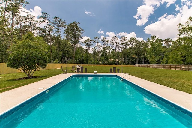 42251 Jefferson Dr, Hammond, LA 70403 - view of swimming pool with view of wooded area