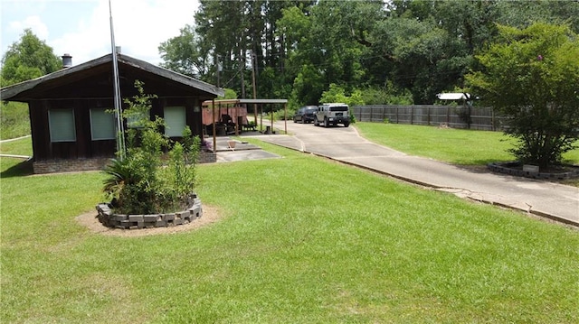 17345,17347,17351 Old Covington Highway, Hammond, LA 70403 - view of yard featuring driveway