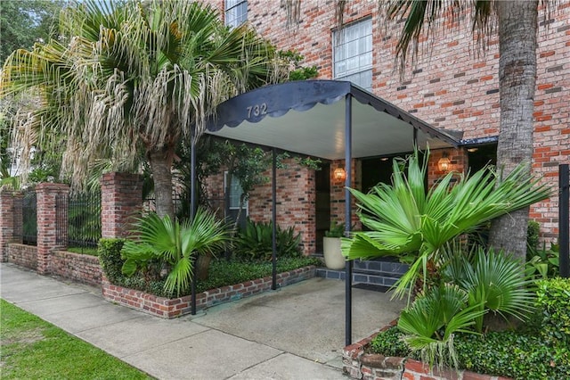 732 Cherokee St Unit 305, New Orleans, LA 70118 - doorway to property featuring brick siding