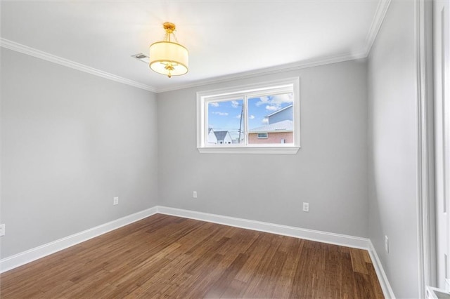 2308 Taft Park, Metairie, LA 70001 - unfurnished room featuring wood finished floors, baseboards, and crown molding
