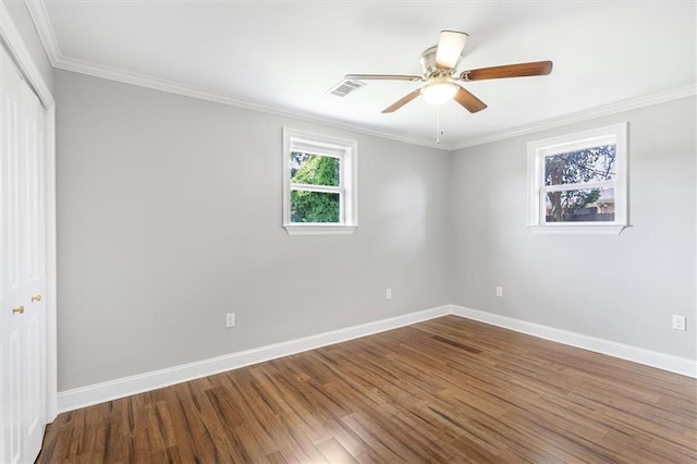 2308 Taft Park, Metairie, LA 70001 - unfurnished bedroom featuring a closet, baseboards, wood finished floors, ornamental molding, and ceiling fan