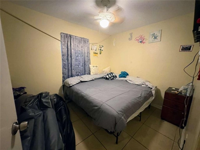 314 W Bordelon St, Gonzales, LA 70737 - bedroom with tile patterned flooring and a ceiling fan