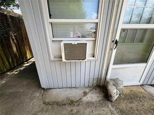 314 W Bordelon St, Gonzales, LA 70737 - exterior view of board and batten siding and cooling unit