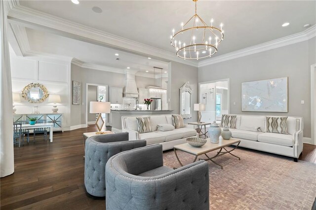 331 Memphis Trce, Covington, LA 70433 - living room with a chandelier, dark wood-style floors, recessed lighting, and ornamental molding