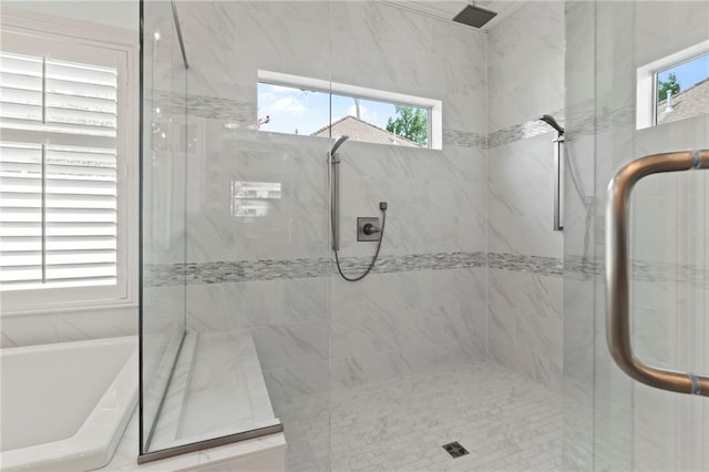 331 Memphis Trce, Covington, LA 70433 - bathroom with a marble finish shower, healthy amount of natural light, and a freestanding tub