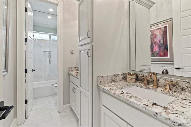 331 Memphis Trce, Covington, LA 70433 - bathroom with vanity, marble finish flooring, toilet,  shower combination, and recessed lighting