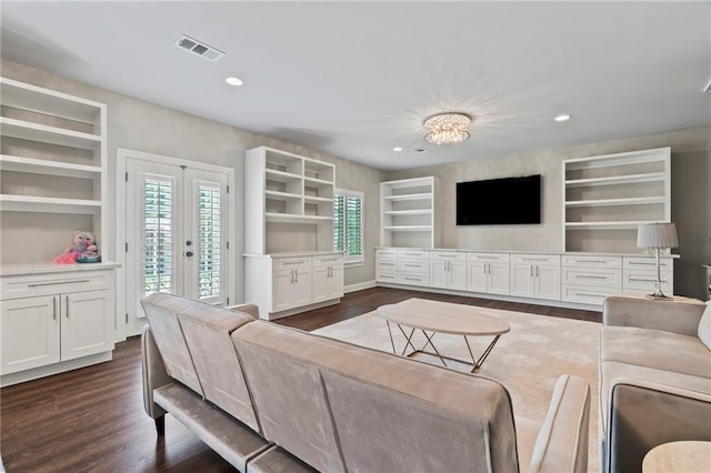331 Memphis Trce, Covington, LA 70433 - living area with french doors, built in features, dark wood-style floors, and recessed lighting