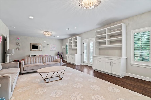 331 Memphis Trce, Covington, LA 70433 - living area with wood finished floors, baseboards, and recessed lighting