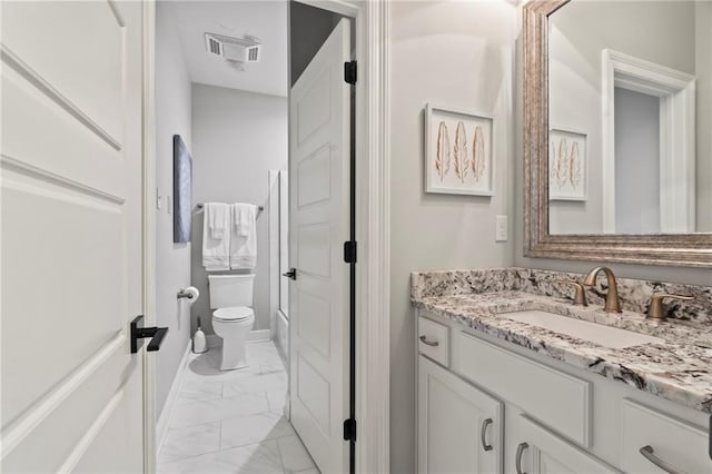 331 Memphis Trce, Covington, LA 70433 - bathroom featuring marble finish flooring, toilet, and vanity