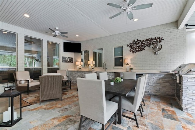 331 Memphis Trce, Covington, LA 70433 - view of patio featuring ceiling fan, outdoor dining space, a sink, and an outdoor hangout area