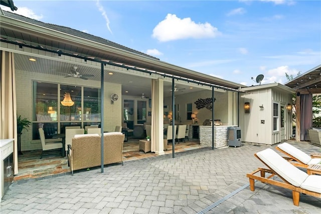 331 Memphis Trce, Covington, LA 70433 - view of patio with a ceiling fan and an outdoor hangout area