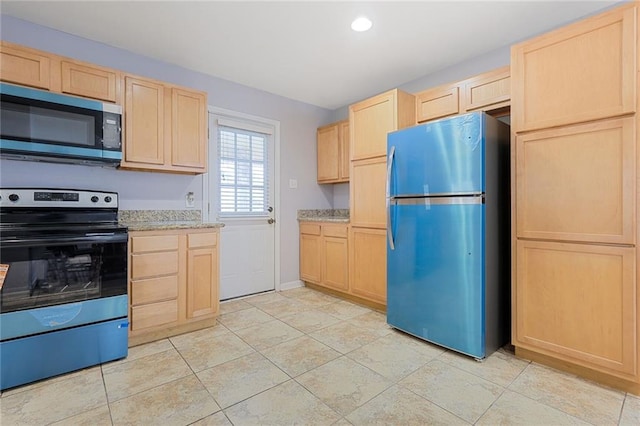 5908 York St, Metairie, LA 70003 - kitchen featuring stainless steel appliances, light brown cabinetry, baseboards, recessed lighting, and light tile patterned flooring